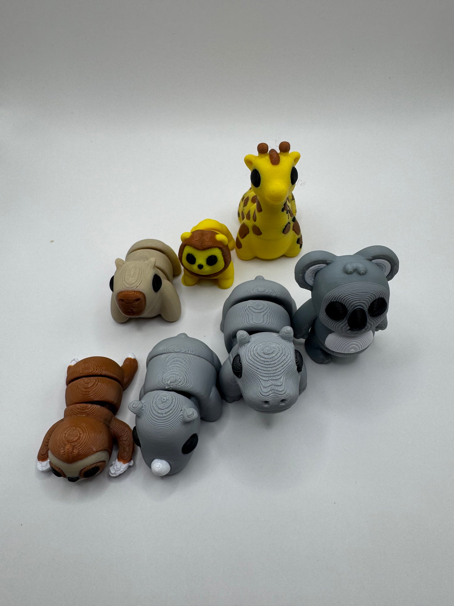 Safari and Jungle Animal Mini Toys – 3D Printed Posable Set with Sloth, Rhino, Koala, Lion, Hippo, Giraffe, Capybara