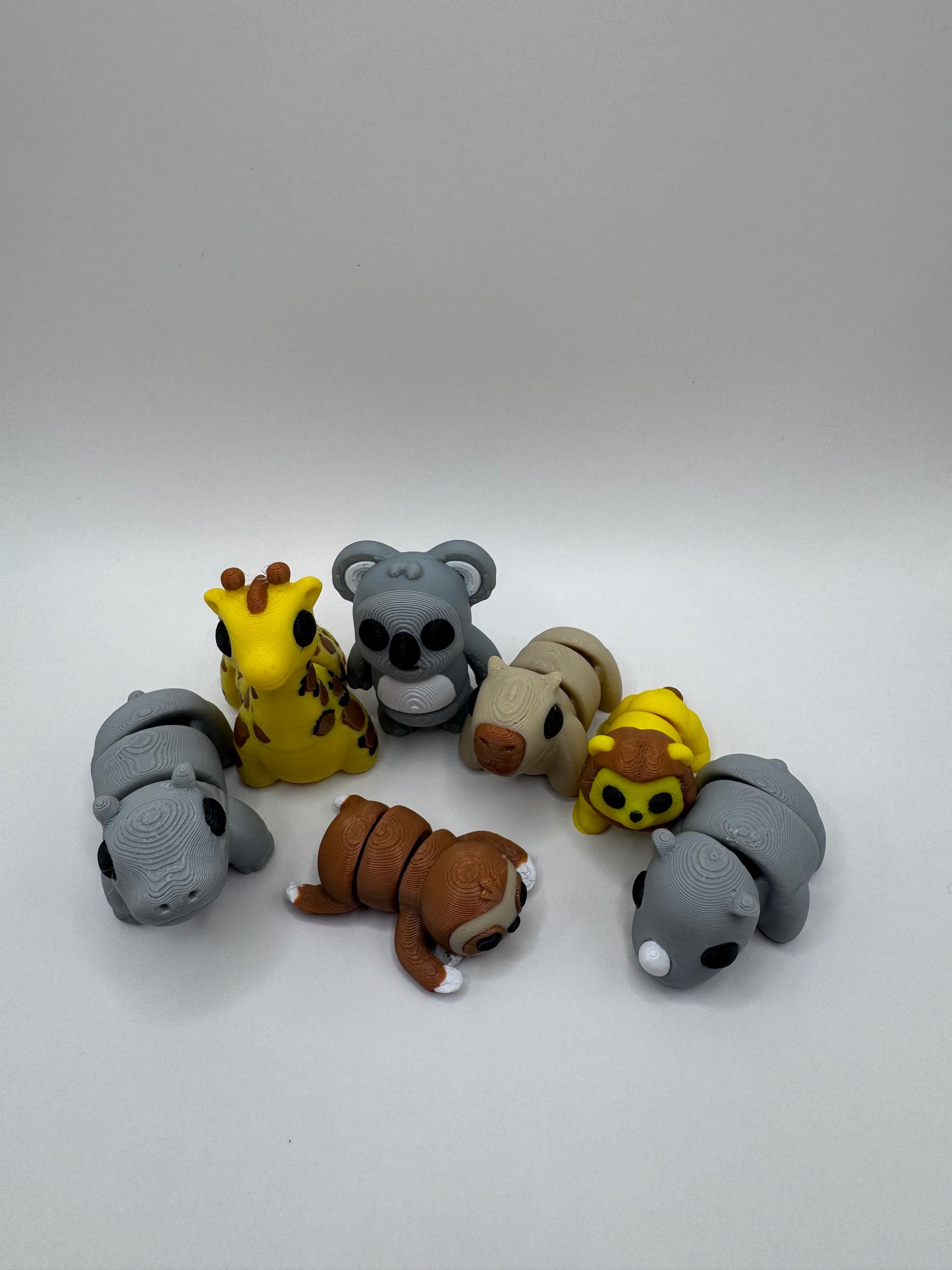 Safari and Jungle Animal Mini Toys – 3D Printed Posable Set with Sloth, Rhino, Koala, Lion, Hippo, Giraffe, Capybara