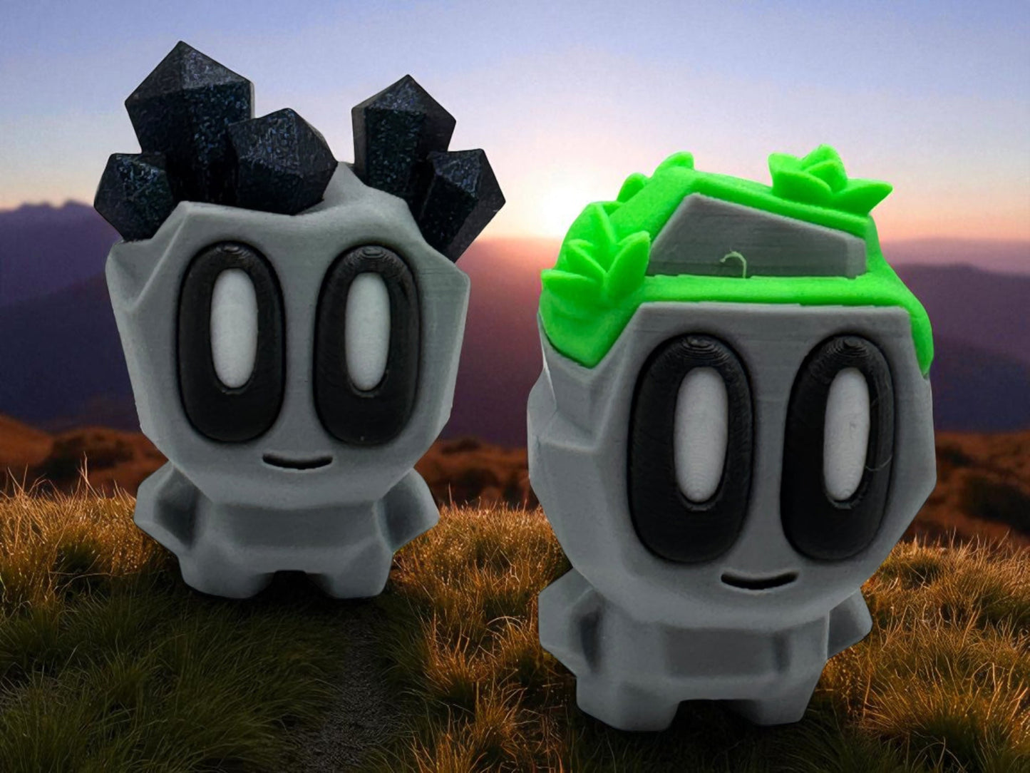 Two cartoon-like figures with black and green hair against a mountainous landscape.