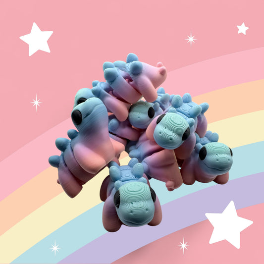 Baby Stegosaurus Articulated Toy – 3D Printed Rainbow Dinosaur Figure | Whimsizoo