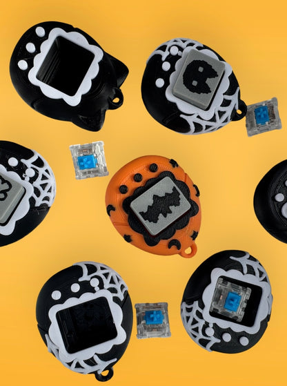 Collection of small electronic devices with various designs on a yellow background